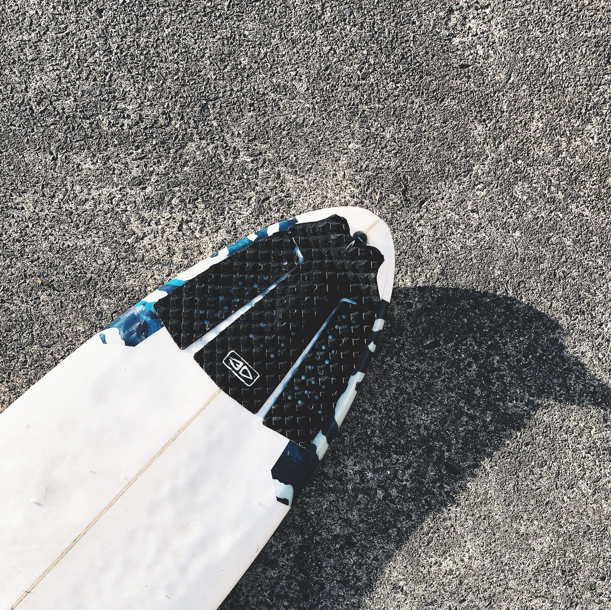 Ocean & Earth Pin Tail Three-Piece Tail Pad: pin-tail grip fitted to a board on the ground
