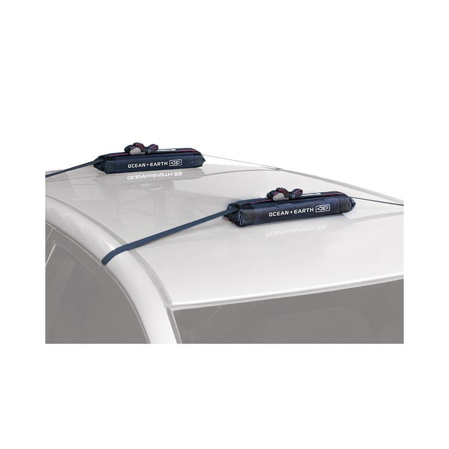 Ocean & Earth Surfboard Quick Rax: Roof-rack pads installed on a car