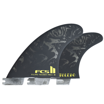 FCS II Filipe Toledo PG Pro Tri Fin Set - Performance Glass: three Filipe Toledo PG Pro fins displayed together