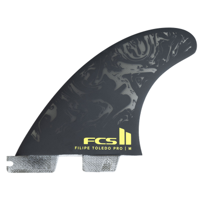 FCS II Filipe Toledo PG Pro Tri Fin Set - Performance Glass: black and Acid fin with Toledo artwork and yellow FCS logo