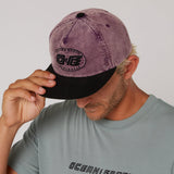 Ocean & Earth Heritage Cap: Plum cap worn, front angle