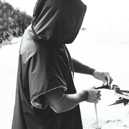 Ocean & Earth Perfect Storm Water-Resistant Poncho: Perfect Storm poncho worn after surfing