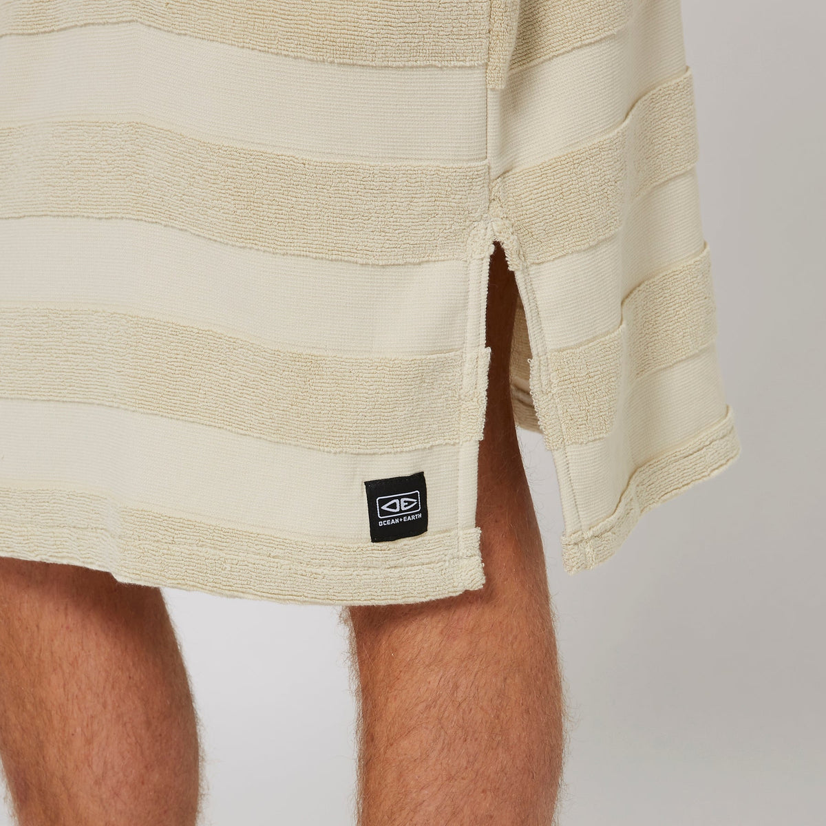 Ocean & Earth Mens Layz Hooded Poncho: Sand woven stripe and lower hem detail