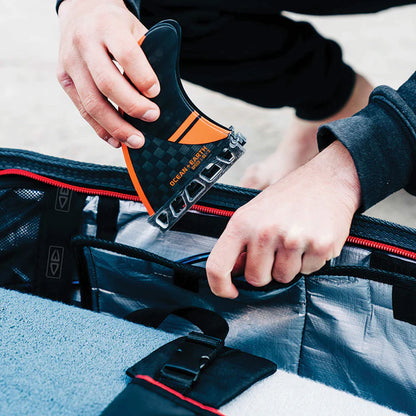 Ocean & Earth Quad Wheel Shortboard Cover: packing the internal fin compartment