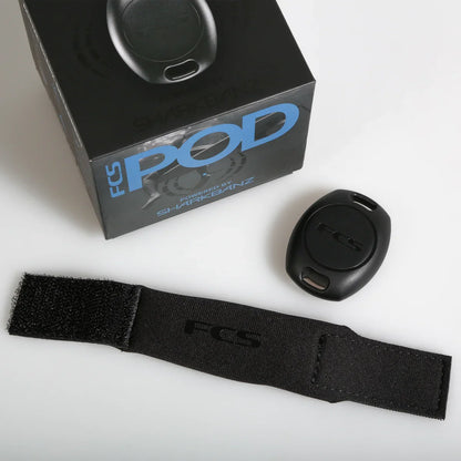 Black pouch opened beside the POD and its box