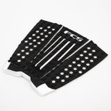 FCS Julian Wilson Traction: angled view of all three black and white pad sections