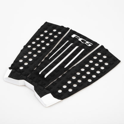 FCS Julian Wilson Traction: angled view of all three black and white pad sections