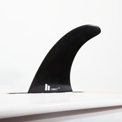 FCS II Connect Longboard Fin - Soft Flex: soft Flex Connect fin installed in a white board