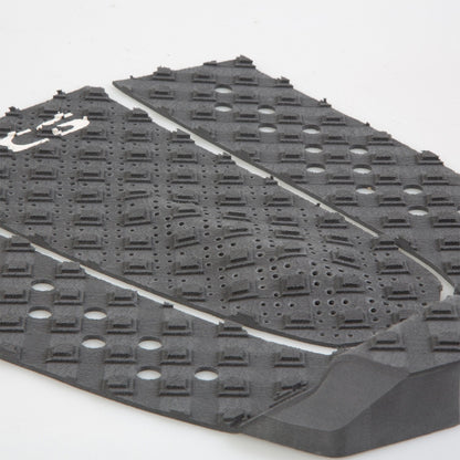 Close detail of raised grip blocks and perforations on the T-3 pad