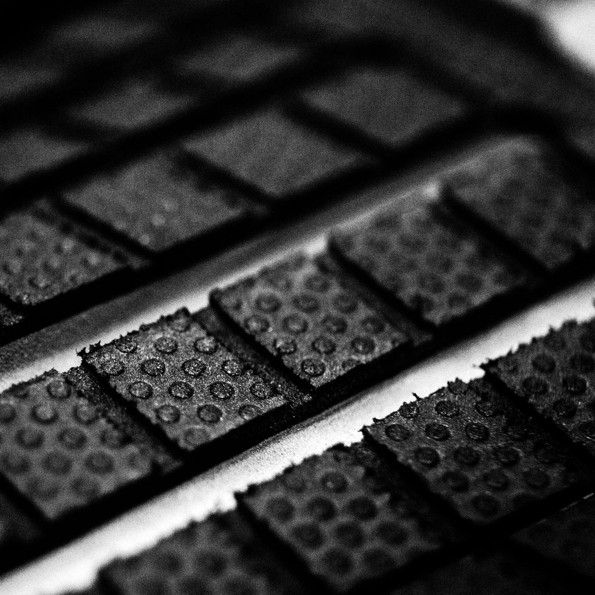 FCS Julian Wilson Treadlite Traction: close view of the textured grip blocks on the Treadlite surface