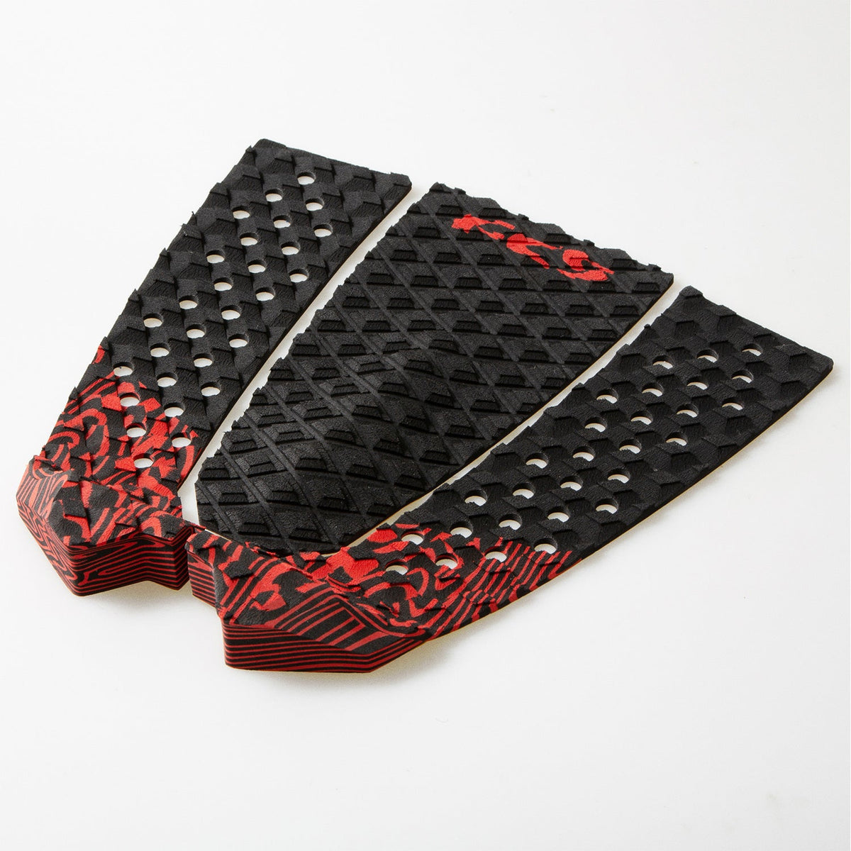 FCS Filipe Toledo Traction: angled view of the Blood pad showing its red kick and arch