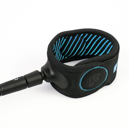 FCS Freedom Helix Leash - Longboard: blue lined longboard cuff and flexible black horn
