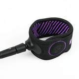 FCS Freedom Helix Leash - Comp 6 ft: purple cuff lining and moulded horn shown close up