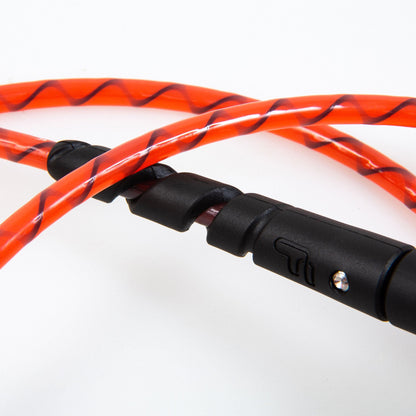 FCS Freedom Helix Leash - All Round: close view of the red cord and black moulded connection