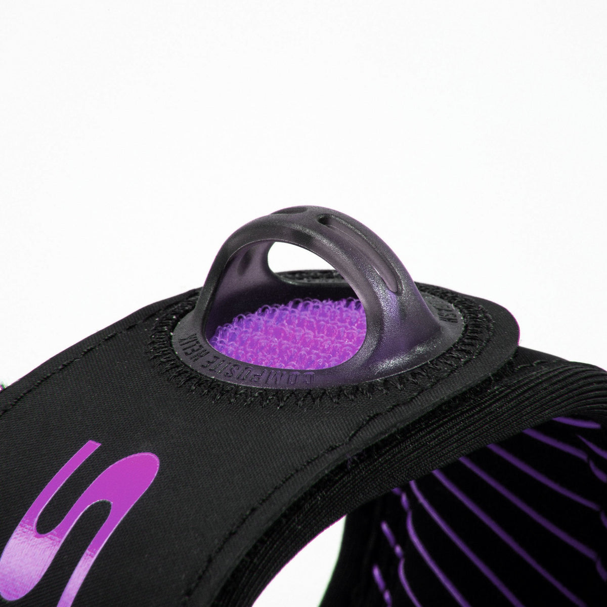 FCS Freedom Helix Leash - Comp 6 ft: finger loop and purple grip print on the quick release tab