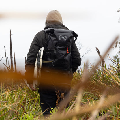 Ocean & Earth Elements 40 L Wetsuit Bag: backpack worn on a coastal walk