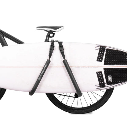 Ocean & Earth Side Loader Bike Rack: Surfboard supported beside the bicycle rear wheel