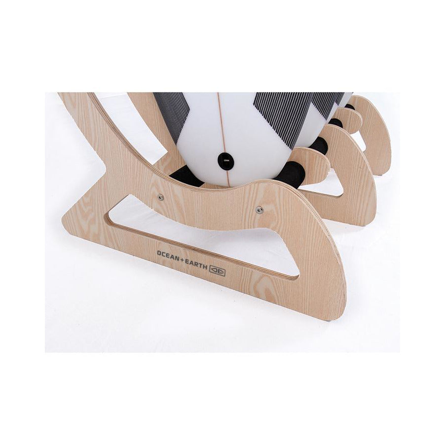 Ocean & Earth Timber Free Standing Rack: Surfboard tails resting in the padded base