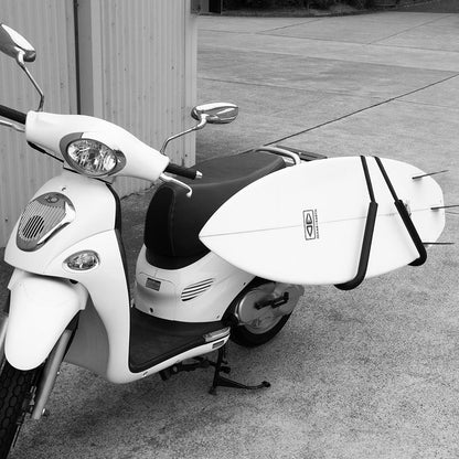 Ocean & Earth Moped & Scooter Surfboard Rack: Surfboard secured alongside a scooter, close view