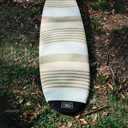 Ocean & Earth Stretch Longboard Sock: longboard sock resting outdoors