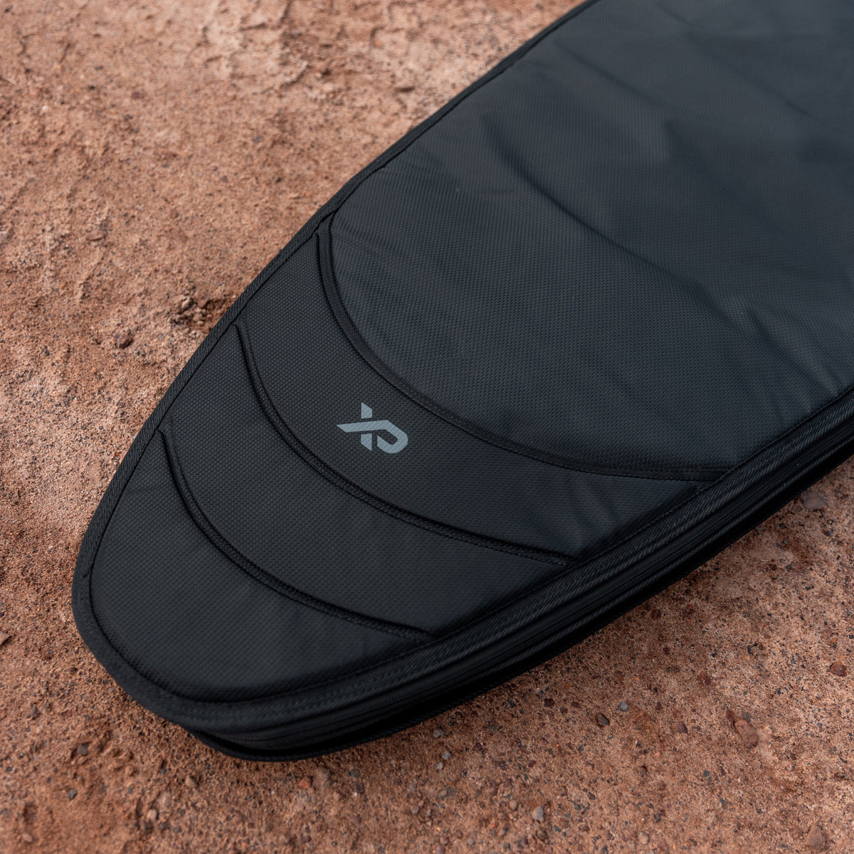 Ocean & Earth HYPA Longboard Travel Cover – 2 Board: cover outdoors beside a path