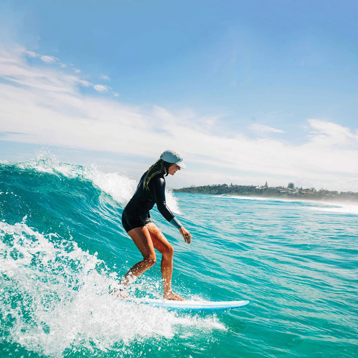 Ocean & Earth Uluwatu Surf Cap: Surf cap worn on a wave