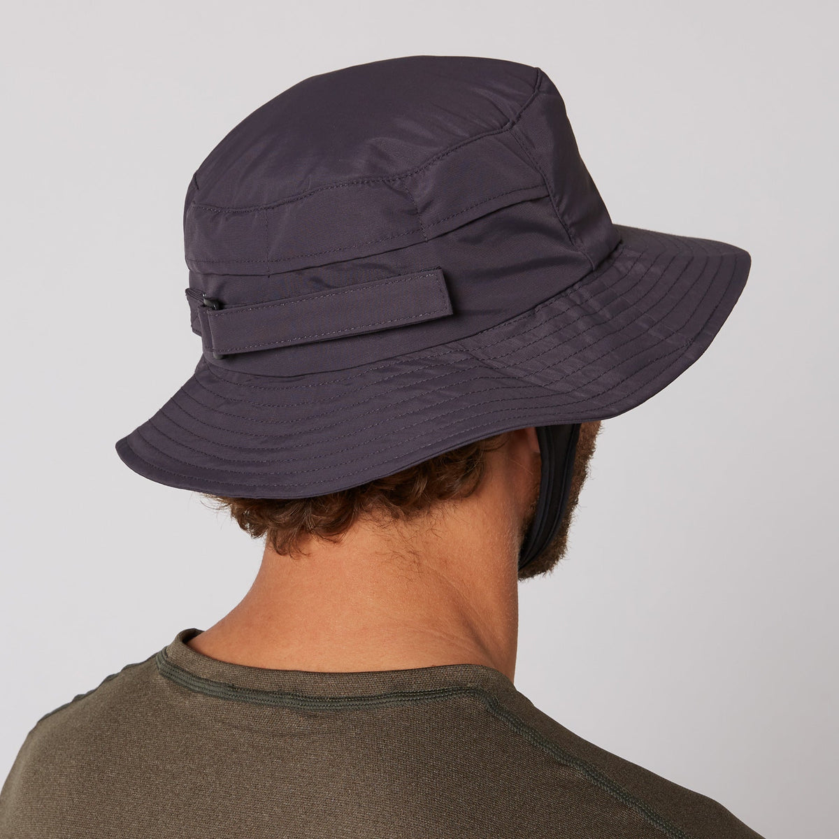Ocean & Earth Indo Stiff Peak Surf Hat: Charcoal hat worn from behind without neck flap