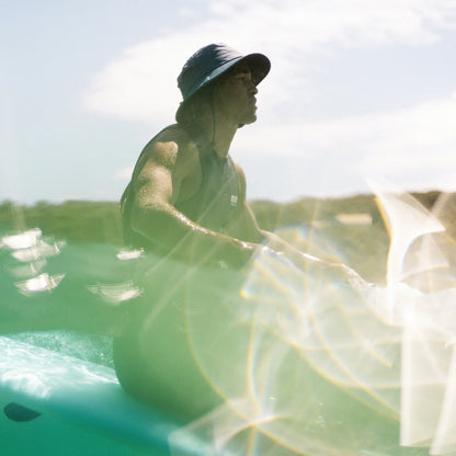 Ocean & Earth Bingin Soft Peak Surf Hat: Soft-peak hat worn in the water