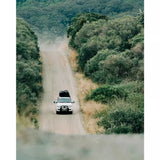 Ocean & Earth Extra Wide Tie Down Straps – 14 ft: Vehicle carrying boards on a dirt road