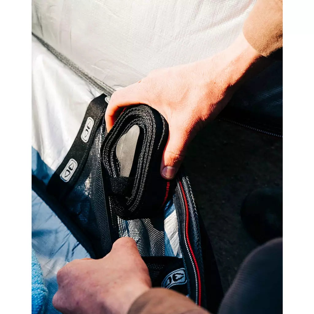 Ocean & Earth Surfboard Tie Down Straps: Tie-down webbing being unrolled