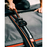 Ocean & Earth Surfboard Tie Down Straps: Strap crossing a surfboard travel bag