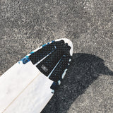 Ocean & Earth Pin Tail Three-Piece Tail Pad: pin-tail grip fitted to a board on the ground