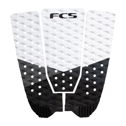 FCS Kolohe Andino Traction: white and black pad showing the custom groove surface