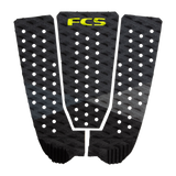 FCS Kolohe Andino Traction: darkness pad with black panels and yellow FCS lettering