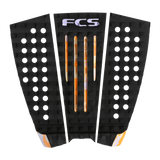 FCS Julian Wilson Traction: black and Multi Camo pad with orange centre channels and patterned side panels